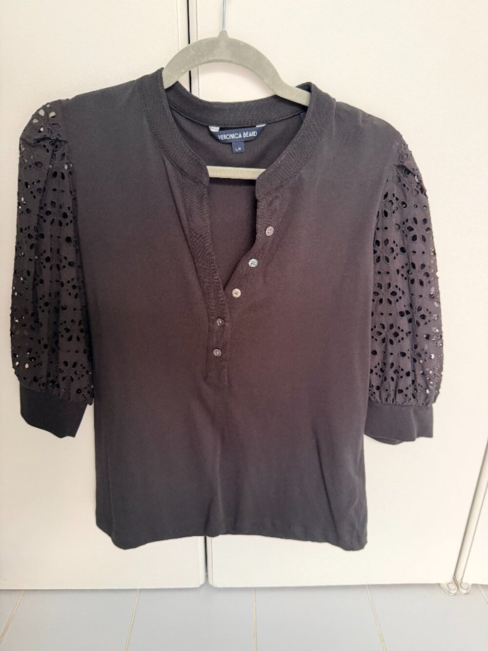 Black Veronica Beard shirt with eyelet sleeves oin size large